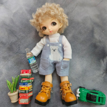 doll in style tiny blue bear