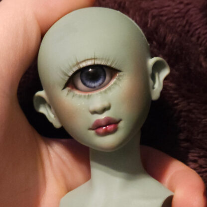 logan doll kaleidoscope cyclops