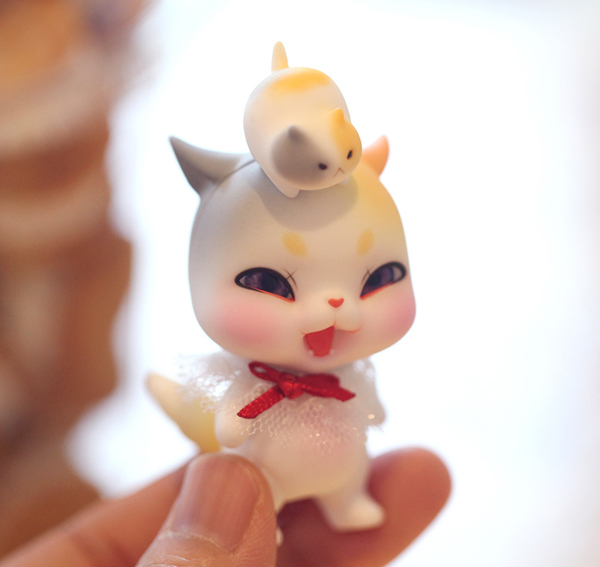 lati orange pet angry new calico cat